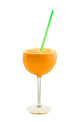Orange fruit cut into goblet shape with straw, isolated on white.