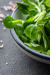 fresh green salad mache leaves healthy meal food snack on the table copy space food background rustic top view 