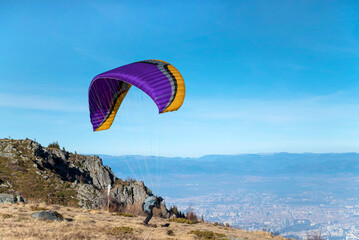 Paraglider at the start above the city of Sofia ,Bulgaria 