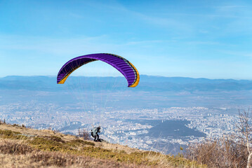 Paraglider at the start above the city of Sofia ,Bulgaria 