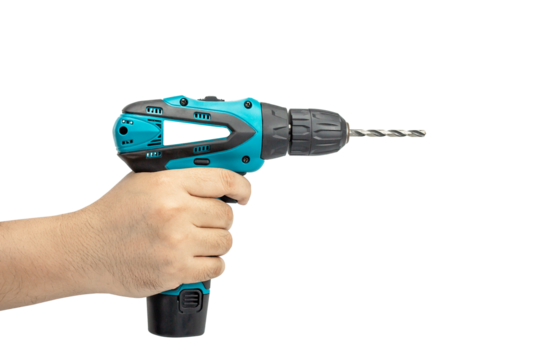Hand holding green cordless drill