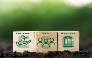 ESG or Environment Social Governance icons on ground with greenery background for sustainable ...