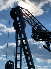 The mechanical part of the lift against the sky. Concept: a special technological facility....