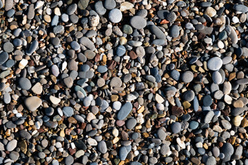 Pebbles and stones : abstract composition.  Background made of multicolored pebbles