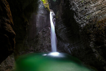 Beautiful Kozjak waterfall along the river Soca near the town of Kobarid in the Julian Alps, close to the famous Napoleon bridge