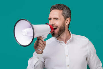 photo of announce man hold loudspeaker. man announce with loudspeaker