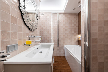 Photo of a bathroom in pastel colors with the lights on