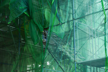 Green shading Net was used prevent construction sewage around construction site. and scaffolding