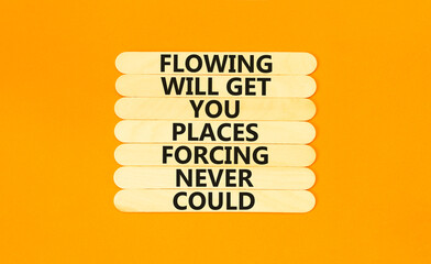 Flowing symbol. Concept words Flowing will get you places forcing never could on wooden sticks....
