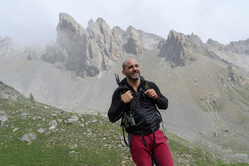 Mountain hiker in Maira Valley, Cottian Alps, Italy