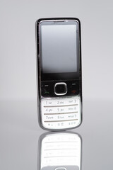 Retro metallic mobile cell phone classic 1990s isolated