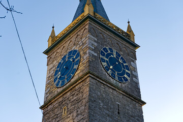 Stone clock tower at the old town at Swiss City of Biel Bienne on a sunny autumn day. Photo taken...