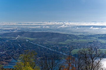 Aerial view from village Magglingen Macolin, Canton Bern, over City of Biel Bienne and lake with Aaare River on a blue cloudy autumn day. Photo taken November 10th, 2022, Magglingen, Switzerland. - obrazy, fototapety, plakaty