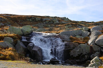 View on a waterfall in the Grimsel Pass which is a mountain pass in Switzerland, crossing the...