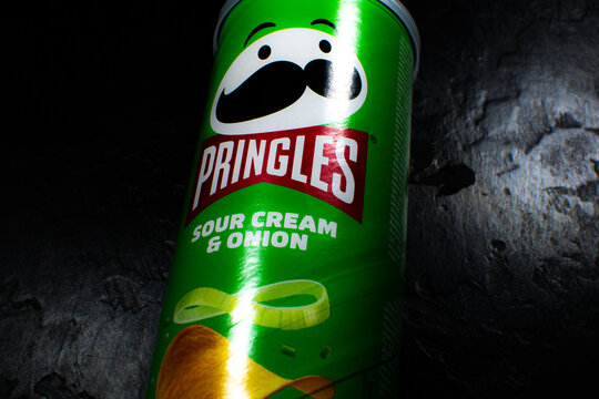 LVIV, UKRAINE - December 20, 2022 : Pringles potato chips with sour cream and onion.