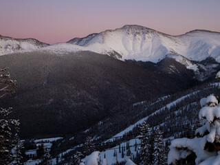 Ski slopes and mountains at sunset in Winter Park Colorado