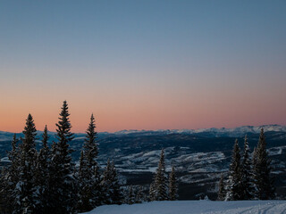 Ski slopes and mountains at sunset in Winter Park Colorado