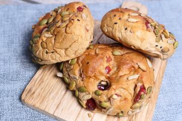 Freshly baked bread in black background, top view