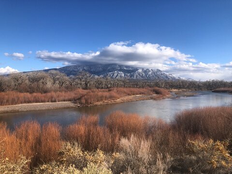 The Rio Grande in winter with a view of the Sandia Mountains