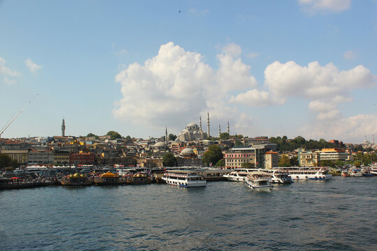 Istanbul Galata district and fishing boats on the beach