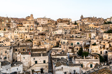 Naklejka premium View at the old town - Sasso Caveoso - of Matera during sunrise Basilicata, Italy - Euope