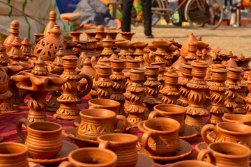 Beautiful Bengali traditional terracotta pots, works of handicraft, for sale during Handicraft Fair in Kolkata. Selective focus.