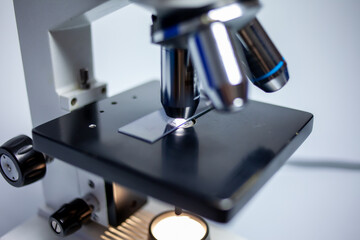 Fototapeta na wymiar Laboratory microscope for the study of biological fluids in the laboratory
