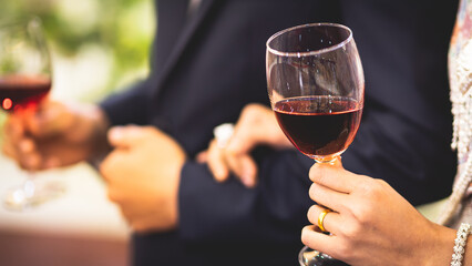 wedding party event people cheering each other with champagne and wine in dinner