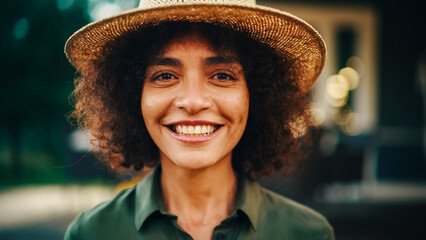 Portrait of a Happy Multiethnic Female Smiling Sincerely, Laughing and Looking at Camera. Young...