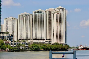 Modern residential condominium building  overlooking the bangkok river, Thailand.
