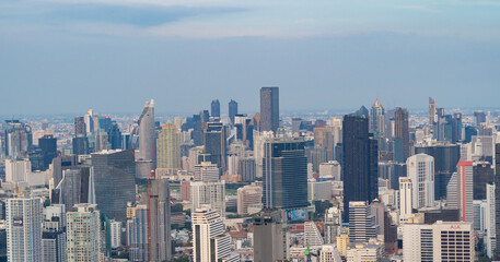 Fototapeta premium Aerial view of Bangkok Downtown Skyline, Thailand. Financial district and business centers in smart urban city in Asia. Skyscraper and high-rise buildings.