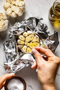 Home baked garlic cloves in baking foil