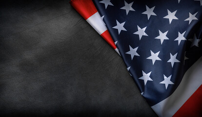 Fototapeta premium USA flag on a dark background. American flag element on a black background. Patriotic concept.