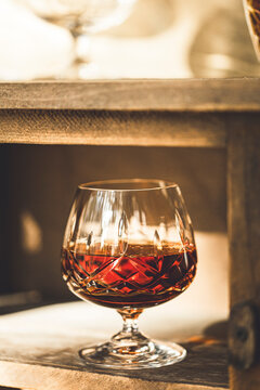 A drink of brandy in a crystal tumbler