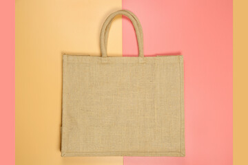 sackcloth handbag on colorful background