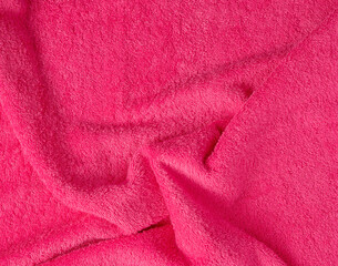 Fototapeta na wymiar Abstract foyer surface of terry pink towel