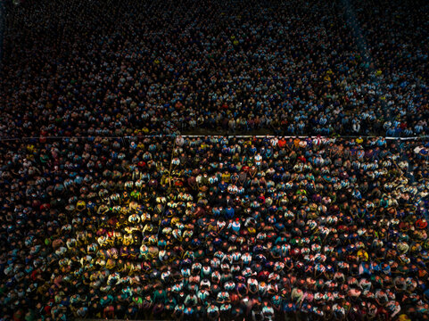 Aerial view of football fans watching football World Cup in the giant screen in Dhaka University Playground, Dhaka, Bangladesh.