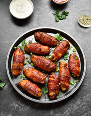 Bacon wrapped grilled chicken wings