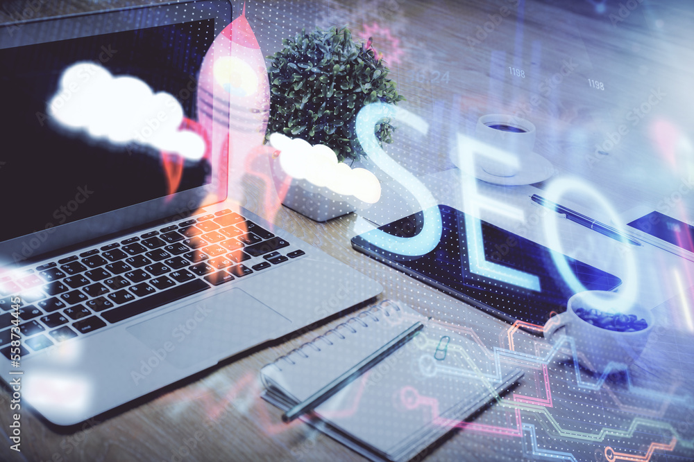 Poster Double exposure of table with computer and seo drawing hologram. Search optimization concept.