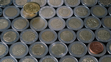 Euro coins on a dark background