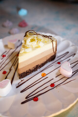 serving dessert cheesecake with marshmallows on a white plate in a cafe