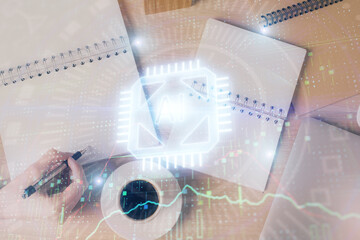 Multi exposure of woman's writing hand on background with data technology hud. Concept of innovation.