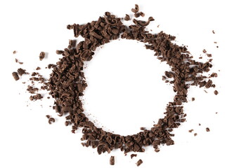 Pile chopped, milled chocolate, frame isolated on white, top view