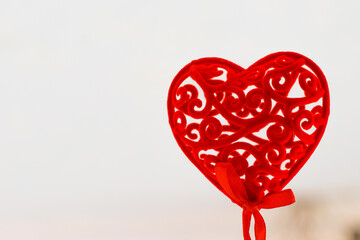 Decorative red heart for valentine's day on a white background.