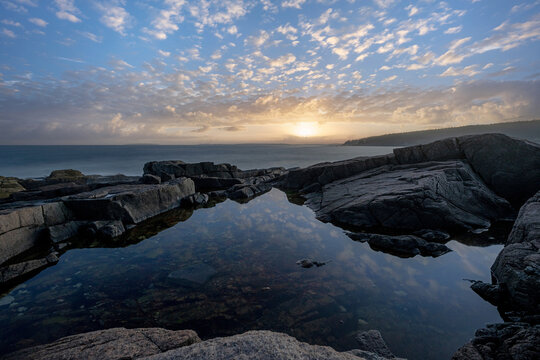 Otter Point overlook tide pool sunset in Acadia National Park, Maine 