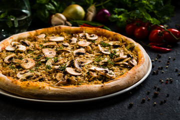 Pizza with mushrooms and ground pork meat