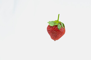 Close-up strawberry fruit on white background