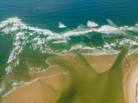Aerial view of the coastline with beach near Manning River, New South Wales, Australia.