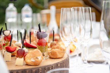 buffet table with snacks and fruits