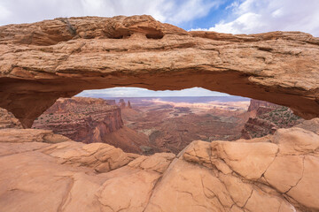 hiking to mesa arch in the island in the sky in canyonlands national park, usa